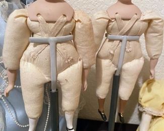 Vintage bisque dolls on stands