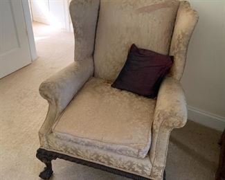 Cream colored wing chair