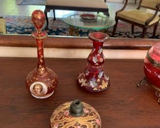 Red glass perfume bottle, decanter, and ink well