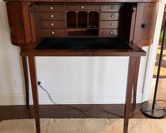 Antique bow-front sideboard/server with leather drop-top. Measures 40" W x 19" D x 38" H. Photo 2 of 5. 