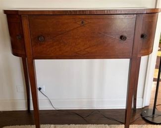 Antique bow-front sideboard/server with leather drop-top. Measures 40" W x 19" D x 38" H. Photo 1 of 5. 
