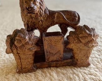 Vintage cast metal lion doorstop. Photo 1 of 2. 