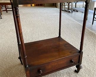 Side table on casters with drawer. Measures 20" W  x 16" D x 26" H. Photo 3 of 3. 