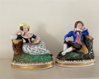 Porcelain Staffordshire-style figurines. 