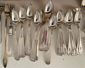 Assorted sterling and silver-plate place settings. Photo 2 of 2. 