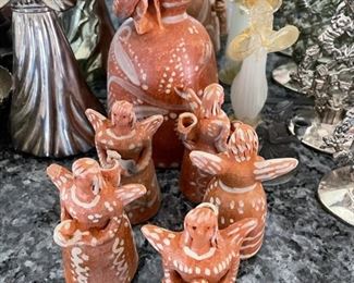 Hand-painted clay angels. 