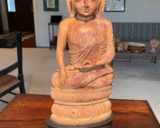 Hand-carved wood Buddha figurine on stand. Measures 17" H. Photo 1 of 3. 