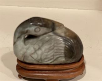Carved jade duck on teak stand. 