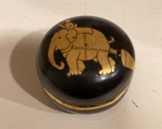 Vintage Thai ebony pill boxes with gold trim elephant motif. 