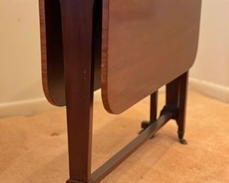 Vintage drop-leaf table.  Needs repair. Broken foot included. Photo 2 of 2. 