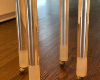 Lucite side table on casters. 