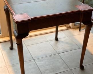 Antique flip-top leather-topped game table. Measures 28" x 28" x 28.5" H. Depth is 15" D when table collapses. Photo 5 of 6. 