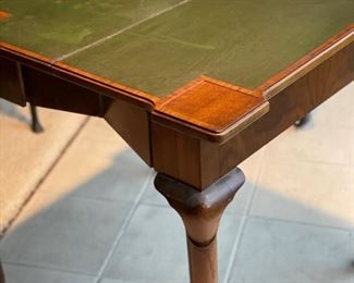 Antique flip-top leather-topped game table. Measures 28" x 28" x 28.5" H. Depth is 15" D when table collapses. (This is true color of the leather). Photo 6 of 6. 