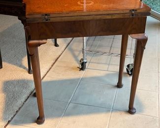 Antique flip-top leather-topped game table. Measures 28" x 28" x 28.5" H. Depth is 15" D when table collapses. Photo 2 of 6. 