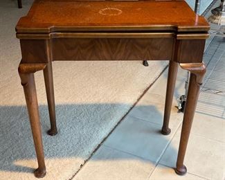 Antique flip-top leather-topped game table. Measures 28" x 28" x 28.5" H. Depth is 15" D when table collapses. Photo 1 of 6. 