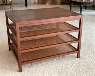 Mid-20th Century Paul McCobb Three-Tier magazine table with cane shelving and leather top. Measures 22" x 28" x 20" H. Photo 2 of 4. 