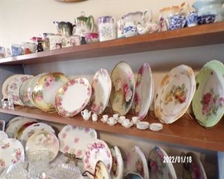 collectible plates, pitcher collection, child tea set
