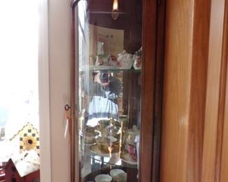 curio cabinet, tea cup collection