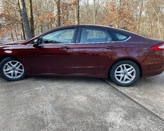 2015 Ford Fusion 31,009 miles, very clean. Small dint in rear (pictured)
