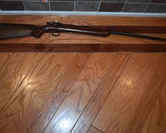 Remington Model 41 Targetmaster Bolt Action Rifle
.22 S/L/LR caliber, 27" barrel, S/N 197531.  Barrel marked with caliber, model, and Remington trademark. Made in the Depression era between 1936 until 1939. Construction is entirely steel metal, with one piece walnut stock. Type is bolt action single shot Rimfire rifle, with pull knob cocking system and collar type bolt safety. Barrel measures 27 inches from muzzle to breech face,