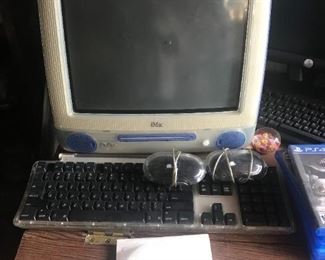 vintage iMac G3 w/ keyboard and two mouses