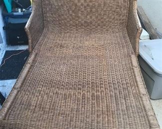 antique rattan double chaise probably came from Nora Desmond's courtyard