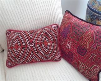 Two of several mola pillows from San Blas Islands, Panama