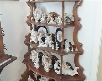 Amazing cherub and angel collection on five-tier etegere.