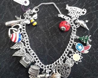 James Avery sterling charms bracelet and charms. Additional charms available that are not attached.