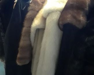 Fur capes, jackets, leather lined jackets, and long fur vest. Coats with fur collars. Sizes Medium to Large