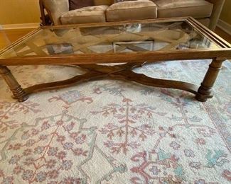 Glass top oak wood coffee table $225