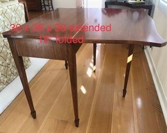 Fold-out extendable occasional table $225