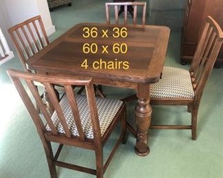 Extendable card table and four chairs $450