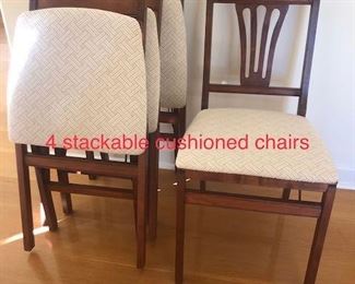 Cushioned, stackable/ folding wooden chairs x 4. No stains, very good condition.  $250