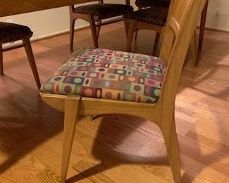 Available now!  Designed by John Van Koert for the Profile collection by Drexel Furniture. Length of the table is 96" with three 12 inch leaves inserted; table is 40 inches in length without any leaves. Chairs measure 20′” X 18″ X 34.5 with a seat height of 19 inches. $1500