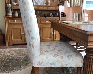 Reduced $600! Classic early American dining table- 44" extendable 93". Six wooden chairs with arms, two upholstery chairs. Can coordinate delivery for a fee. 