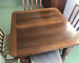 Extendable card table and four chairs $450