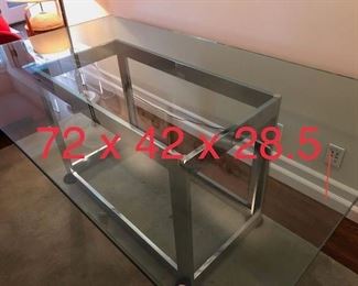 Available now! Glass top chrome base 6' table $300. Delivery available please enquire.
