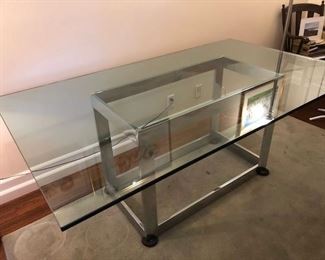 Available now! Glass top chrome base 6' table $300. Delivery available please enquire.