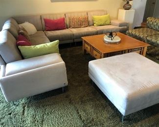 Sectional 108x108x18 and matching large ottoman 36x36x18. excellent condition. Dark cream suede. Italian, Natuzzi. $1600. No pets, no smoking.