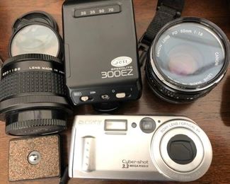 $250. Camera bundle (will not separate). Canon EOS650, Canon FTb, canon lenses 35-105, 35-105 FD, 50mm FD, Asanuma 28mm. Speedlite 300EZ. Sony 3.3mp Cybershot. 2 x Lowepro bags. Misc items battery, lens covers etc. 