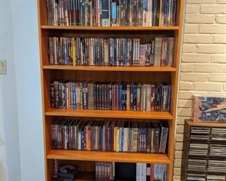 BOOKCASE FULL OF DVD'S priced $3 each