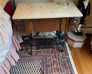 Sewing machine stand with marble top - no machine inside -$100.