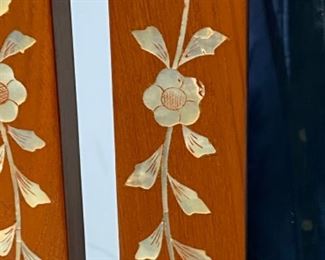 Detail of inlaid mother of Pearl on 4 panel mirror.