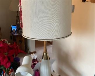 . . . one of a pair of retro milk-glass lamps