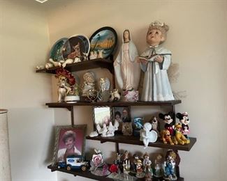 . . . more collectibles on wall shelf