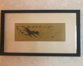 a crow about to eat a fly