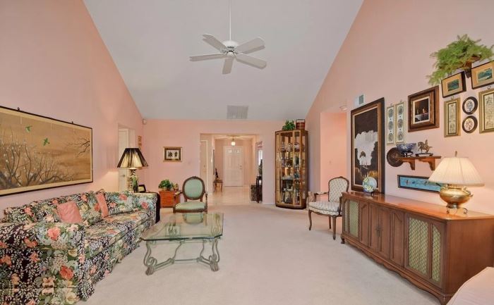 Sofa, coffee table, Scott Copley console, curio cabinet, wall prints, lamps, etc.