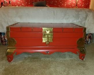 Beautiful red and brass trunk