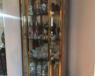 Curio cabinet filled with lots of trinkets!